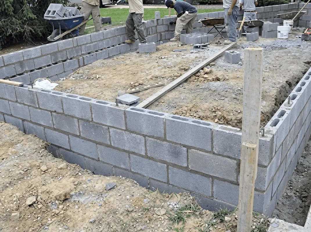 Professionals building a foundation with blocks in Sacramento, CA