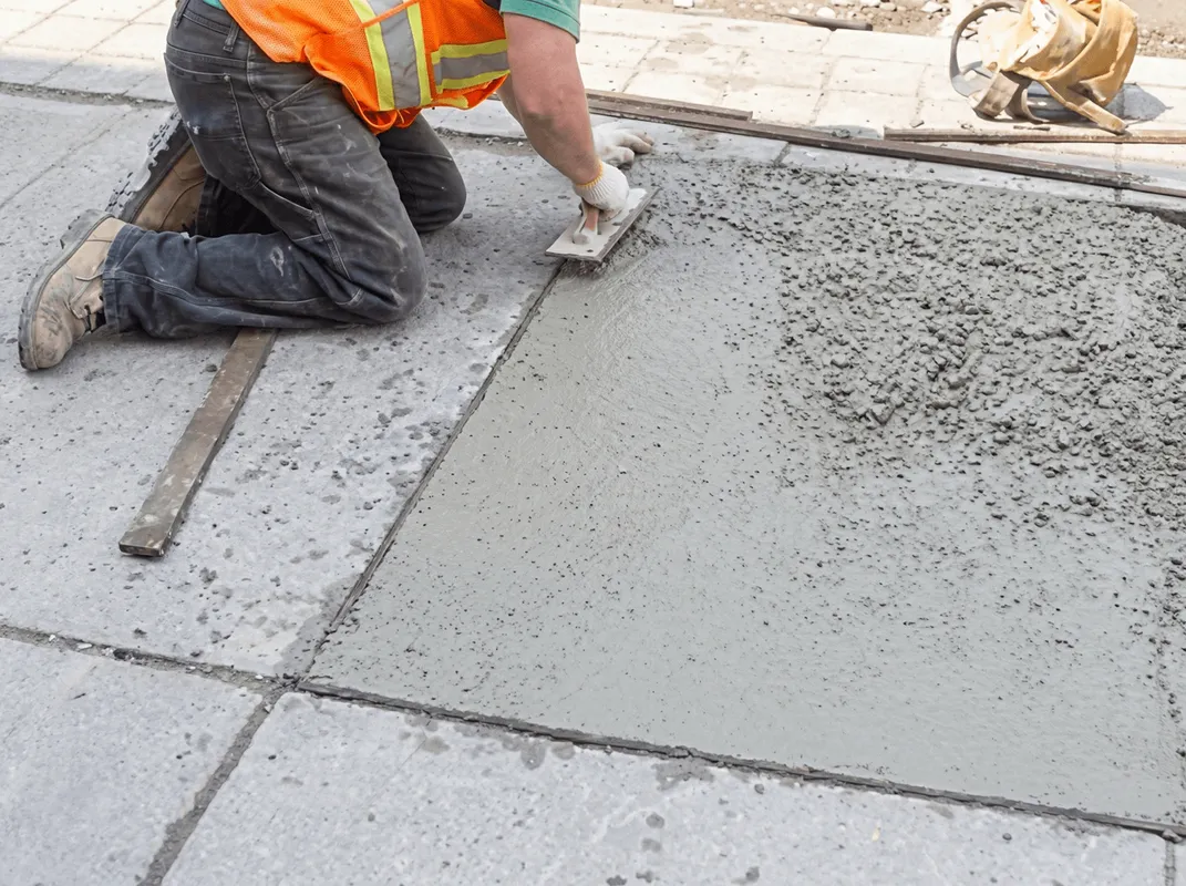 Professional repairing a concrete floor in Sacramento, CA
